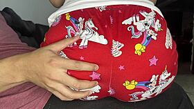 Innocent stepdaughter sits on stepfather's lap to eat while he enjoys her presence