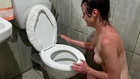 This human toilet slut humiliates herself pissing on her own face.
