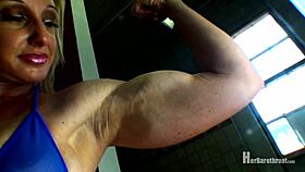 muscular bodybuilder performs dance in bikini and thong