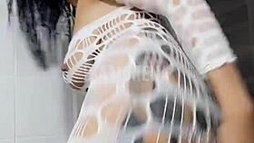 tattooed brazilian morena's funky dance is intriguing