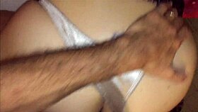 white milf in satin corset shows tits and ass in homemade video