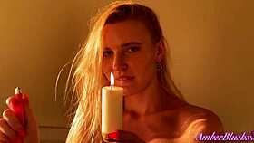 a horny blonde teen with big ass explores candle waxplay on her tits during solo masturbation session