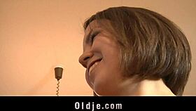 Old man talks to cute young teen.