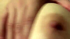 Her big tits bounce wildly as she's fucked in the ass.