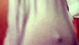 Her big tits bounce wildly as she's fucked in the ass.