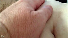 Rubbing her hairy milf pussy