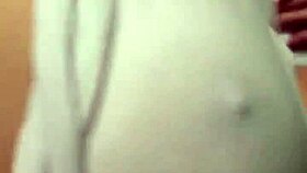 Her big tits bounce wildly as she's fucked in the ass.