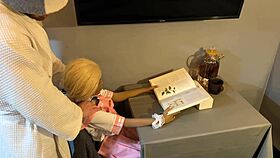 Horny man distracts sex doll from book