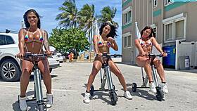big ass latinas ride electric trikes at public beach with extreme webcam vibes 😎