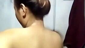 asian student bathing in khmer shower