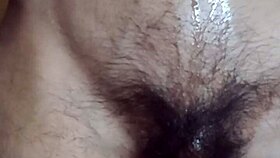 gay solo guy playing with navel and finishing