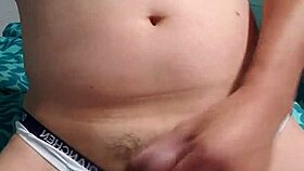 gay boy intensely masturbates in his underwear with passion