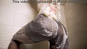 Hot Milf Teasing In The Shower With Wet Pantyhose.