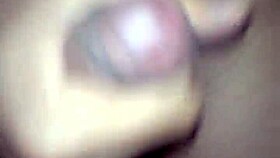 Asian Teen Zero Delivers Intense Handjob in Dark Hardcore Scene