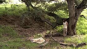 girl in cosplay plays with her pussy naked outside in the woods