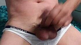 gay boy intensely masturbates in his underwear with passion