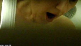 Hidden camera spying on roommate in shower