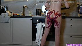 i feel so emotional watching this naked housewife with octopus tattoo on ass cook dinner in the kitchen