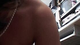 This mature brunette slut is getting fucked at work with big tits and handjob