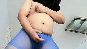 This gay boy is wearing silk stockings and looking super sexy