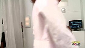 Horny nurse handles a huge black cock with skill.