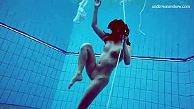 i love this horny teen 18+ getting naked fast underwater showing tight pussy
