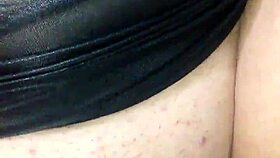 face mask on, black dildo in mouth