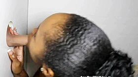 Beautiful petite ebony hottie with small tits and nice ass blowing strangers in glory hole.