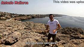 horny spanish couple bends over for threesome on beach