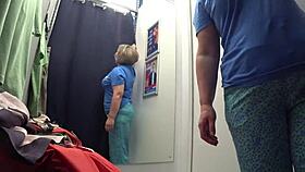I caught a curvy milf in the fitting room with big ass in white panties.