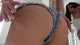 The brunette took off her shorts and shows off on camera solo masturbation and striptease