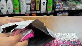 Asian ladyboy teases with new thong in convenience store