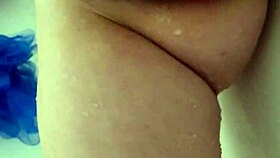 Teen girlfriend masturbates in shower, cream running down shaved legs