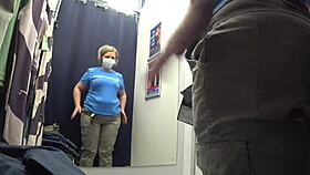 I caught a curvy milf in the fitting room with big ass in white panties.