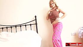 Curvy blonde shows her amazingly huge boobs to the camera