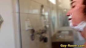 Two twinks hang out in the bathroom with tattoos.