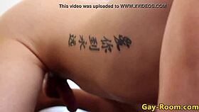 Two twinks hang out in the bathroom with tattoos.