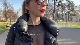 Wow, this beauty flashes her big boobs while walking in a public park!