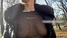 Wow, this beauty flashes her big boobs while walking in a public park!