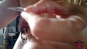 Nippleringlover Horny Milf Sticking Tattoos on Huge Pierced Nipples?