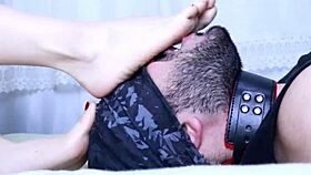 Goddess Nulien enjoys foot worship after a night of dancing.