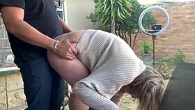 Fucking my friend’s wife hard on the patio outside. Shaved brunette takes it all with ease.