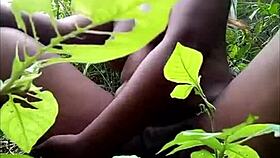 Why is that tribal african fingering herself in the woods?