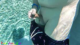 Gay guy jerks fat cock in public thermal pool underwater fun