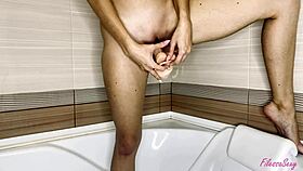 Cute Babe Fingers Pussy With Dildo In Bathroom!