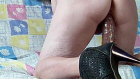 The dildo failed to enter the wife on the sofa.