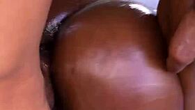 Black beauty gets oiled up for some hot sex with her neighbor