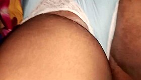 My stepfather gently caresses my chubby cheeks during a family gathering.