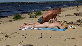 A family with a big ass woman having sex on the beach
