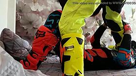 Gay biker treads boots in motocross